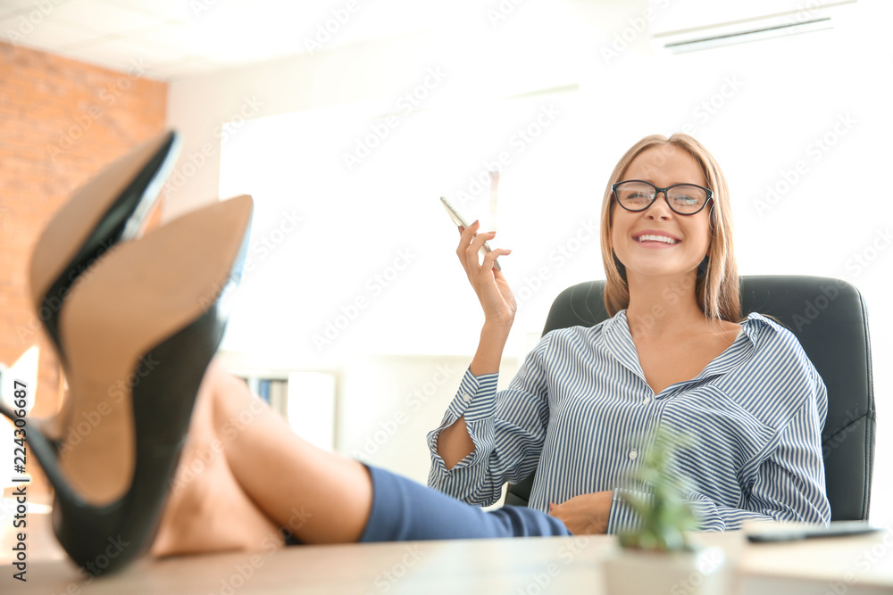 Young businesswoman working in office