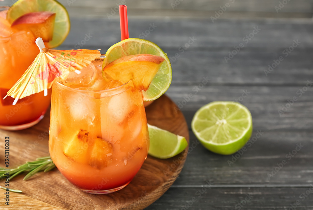 Fresh summer cocktail in glasses on wooden board
