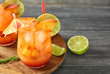 Fresh summer cocktail in glasses on wooden board