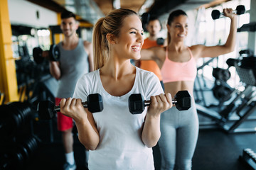 picture of cheerful fitness team in gym