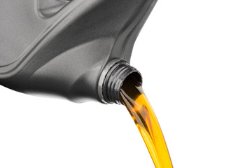 Wall Mural - Pouring oil lubricant motor car from gray bottle on isolated white background