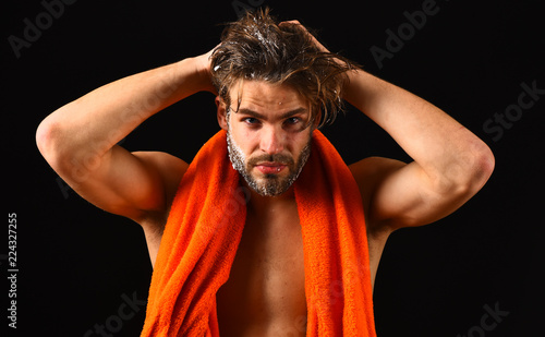 Man With Orange Towel Wipe Hair Wash Off Foam With Water