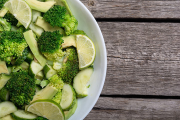 Wall Mural - Green salad with avocado