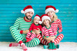 © Sunny studio - Happy family having fun at Christmas time