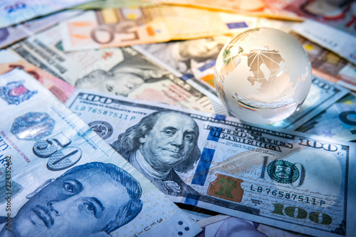 Global Business And Economy World Globe Crystal Gl On Various World Globe Crystal Gl On Various International Money Banknotes Currency