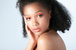 © Mirrorstudio - Young beautiful black girl with clean perfect skin close-up