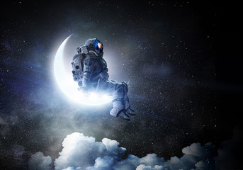 Wall Mural - astronaut sit on crescent moon. mixed media