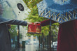 © Сергей Коваль - It's raining, the girl gives her friend a cake. A gift in the autumn morning. They are standing under umbrellas. Идет дождь, девушка дарит подруге торт. Подарок осенним утром. Они стоят под зонтами.