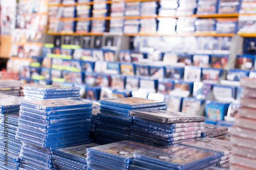 Fotografía CDs and DVDs on piles at store