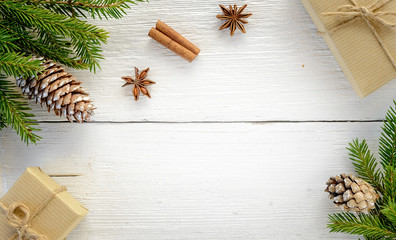 Wall Mural - Christmas composition made of gifts fir branches cones