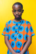 © Gerald Carter/Creative Flame - Portrait of teen boy wearing traditional African clothing