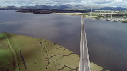 Wall Mural - Aerial footage of traffic crossing Clackmannanshire Bridge over the River Forth.