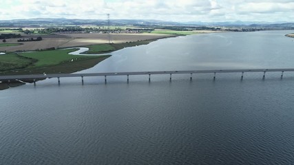 Wall Mural - Aerial footage of traffic crossing Clackmannanshire Bridge over the River Forth.