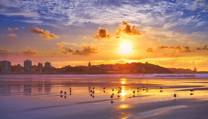 Canvas Print - Gijon skyline sunset in San Lorenzo beach Asturias