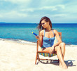 © Acronym - Fit and sporty young girl posing on a Thai beach. Travel, vacation, holiday, concept.