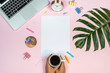© immstudio - Feminine desk workspace with white paper mockup on pink background. Flat lay, top view.