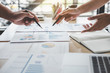 © Freedomz - Business colleagues meeting to conference professional investor working a new marketing business strategy project discussion and analysis data chart and graph, finance and accounting concept