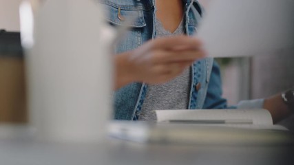 young business woman using laptop software developer designing mobile application brainstorming creative ideas for communication app listening to music in office