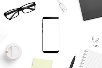 Aufkleber - Smart phone mockup on white office desk surrounded with office supplies. Business, corporate concept. Top view.