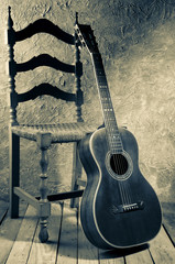 Wall Mural - vintage blues guitar with old chair