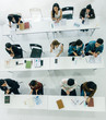 © saksit - Top view of Audience of the lecturer in the conference hall meeting room