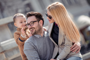 Wall Mural - Portrait of happy family having fun together