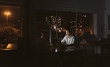© mavoimages - Asian businessman working at his desk late in the evening