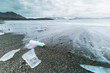 Plastic pollution on Arctic coast.