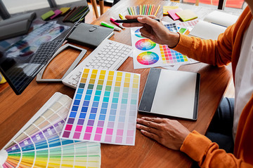 Wall Mural - creative web designer planning application and developing template layout, framework for mobile phon