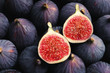 Fresh ripe figs as background, top view. Tropical fruit