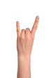 © Vladyslav Siaber - woman's hand showing Sign of the horns.isolated over white