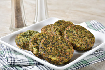 Sticker - Serving plate of spinach cakes