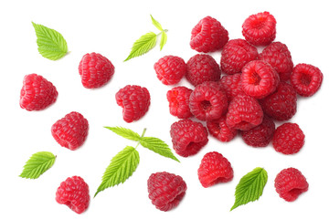 Wall Mural - ripe raspberries with green leaf isolated on white background. top view