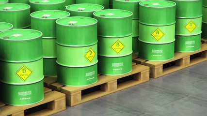 Wall Mural - Group of rows of green stacked biofuel drums in storage warehouse