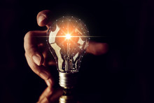 Man Hand Choose Glow Light Bulb Creativity Business Ideas Concept Black Background