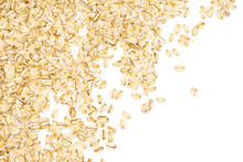 Lot Of Whole Flat Raw Rolled Oats Left Upper Corner Isolated On White Background