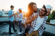 © NDABCREATIVITY - Happy cheerful friends spending fun times together