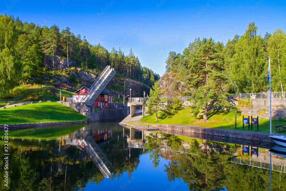 View of the Telemark Canal with old locks - tourist attraction in Skien, Norway - obrazy, fototapety, plakaty 
