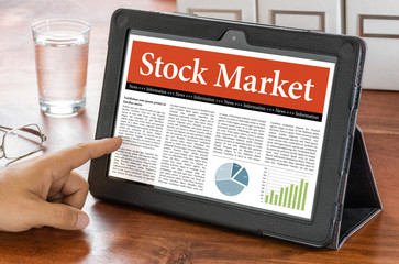 Wall Mural - a tablet computer on a desk - stock market