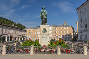 Wall Mural - Wolfgang Amadeus Mozart monument statue at the Mozartplatz square in Salzburg, Austria.