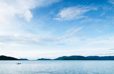 Wall Mural - Peaceful sea evening sky and small local fishing boat of Koh Mud Sum island near Samui isalnd, Thailand