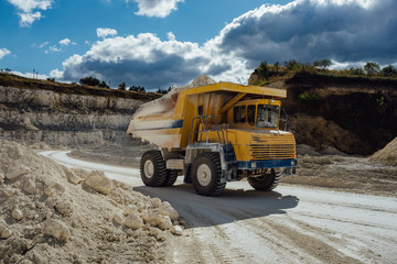 Wall Mural - Chalk quarry. Moving dump truck loaded with chalk 
