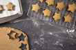 Holiday Gingerbread Stars Being Made on a Dark Surface