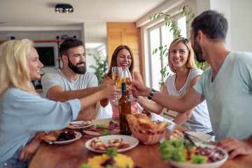 Wall Mural - Group of friends having great time at home