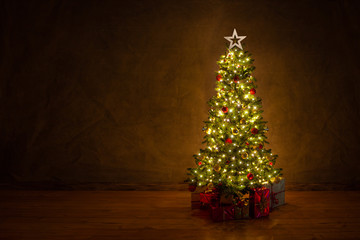 decorated christmas tree with many colorful gifts