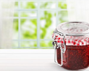 Wall Mural - Glass jar with raspberry jam