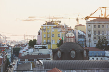 Wall Mural - Beautiful super wide-angle aerial view of Lisbon, Portugal with harbor and skyline scenery beyond the city, shot from belvedere observation deck Rua Augusta Triumphal Arch Viewpoint, Commerce Square