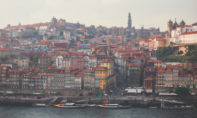 Wall Mural - Beautiful super wide-angle panoramic summer aerial view of Old Porto Oporto city and Ribeira Square with the old town, during the sunset over Douro river from Vila Nova de Gaia, Porto, Portugal