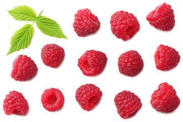 Wall Mural - ripe raspberries with green leaf isolated on white background. top view