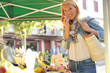 © goodluz - Middle-aged woman at the green market
